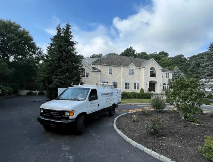 University Heights Power Washing technician performing thorough gutter cleaning service in University Heights