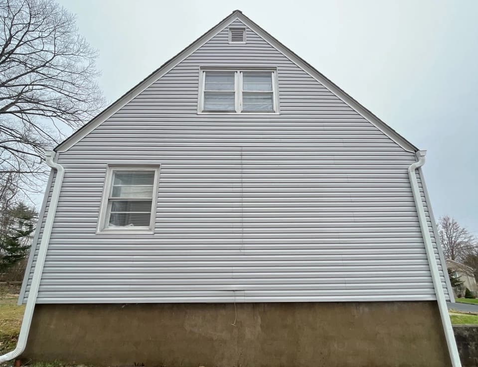 University Heights Power Washing technician performing detailed house washing in University Heights residential area